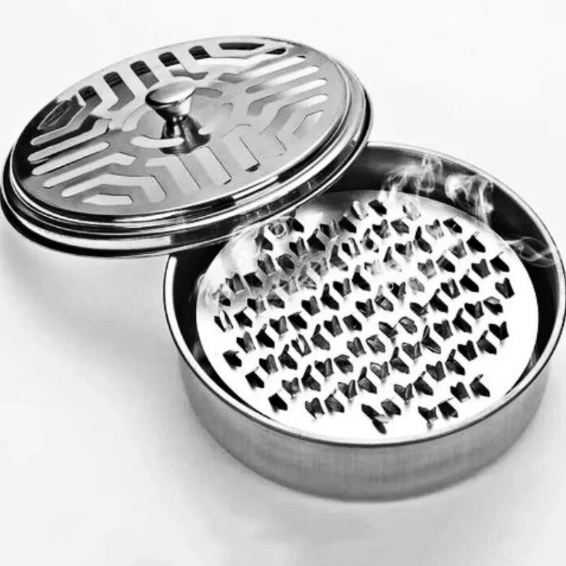 Stainless steel mosquito coil holder with a lid, showing the perforated base and the removable top.