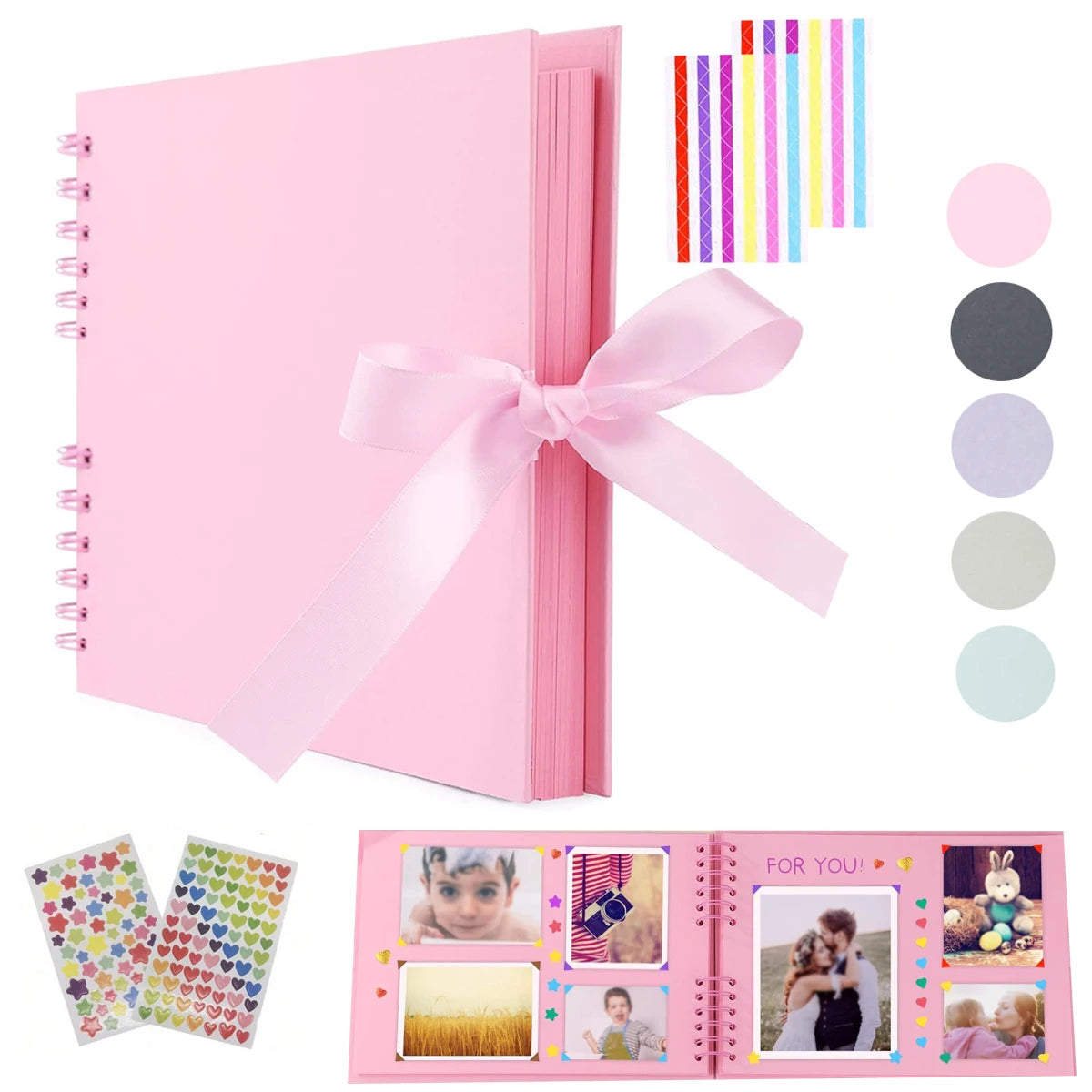 Pink scrapbook album with ribbon and decorative pages for crafting