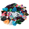 A pile of assorted guitar picks in various colors and thicknesses.