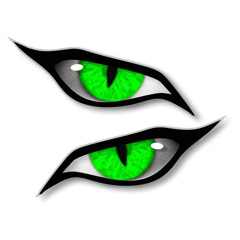 A pair of stylized, reflective cat eye stickers featuring bright green irises and black outlines.