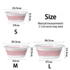 Three sizes of pink and white foldable plastic wash basins labeled S, M, and L with corresponding dimensions.