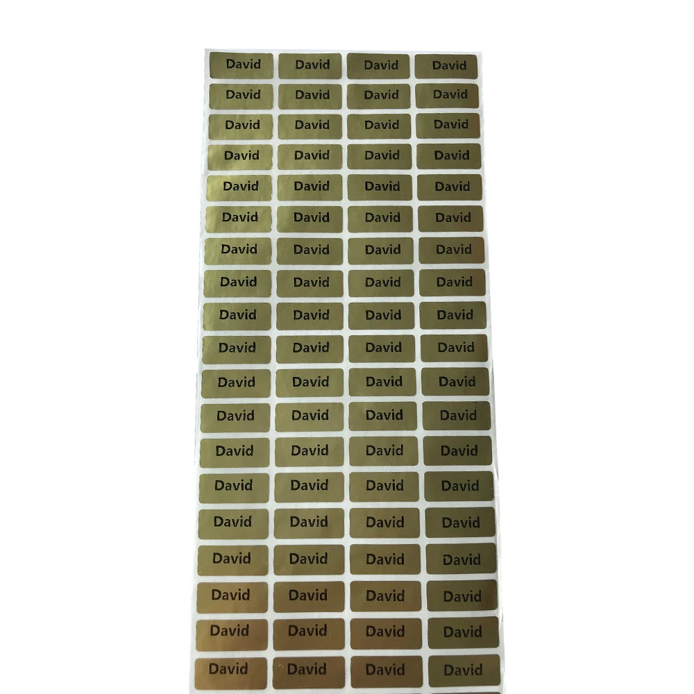 A grid of small, square matte gold name stickers with the name David printed on each one.
