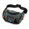 A dark green tactical chest bag with black straps and orange accents is shown against a white background.