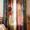 A set of two colorful boho ethnic patchwork print curtains hanging in a bright room.