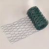 A roll of green PVC-coated hexagonal garden fencing netting laid out next to a flat piece.