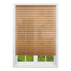 A horizontal pleated paper window blind in a light brown color installed in a white window frame.