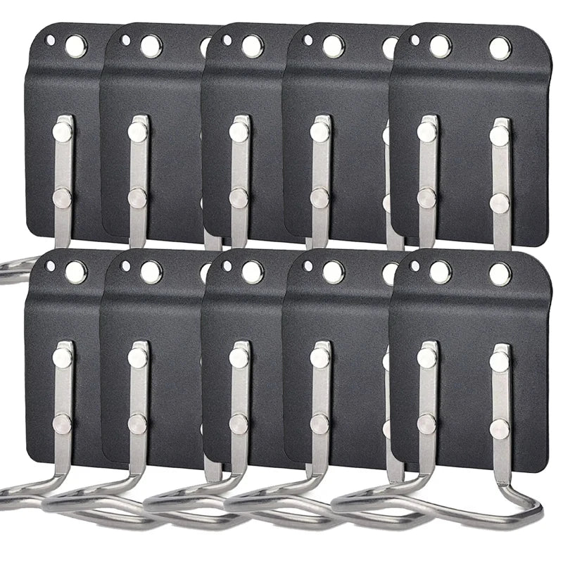 A set of black clip-on tool belt holsters designed for drills and power tools.