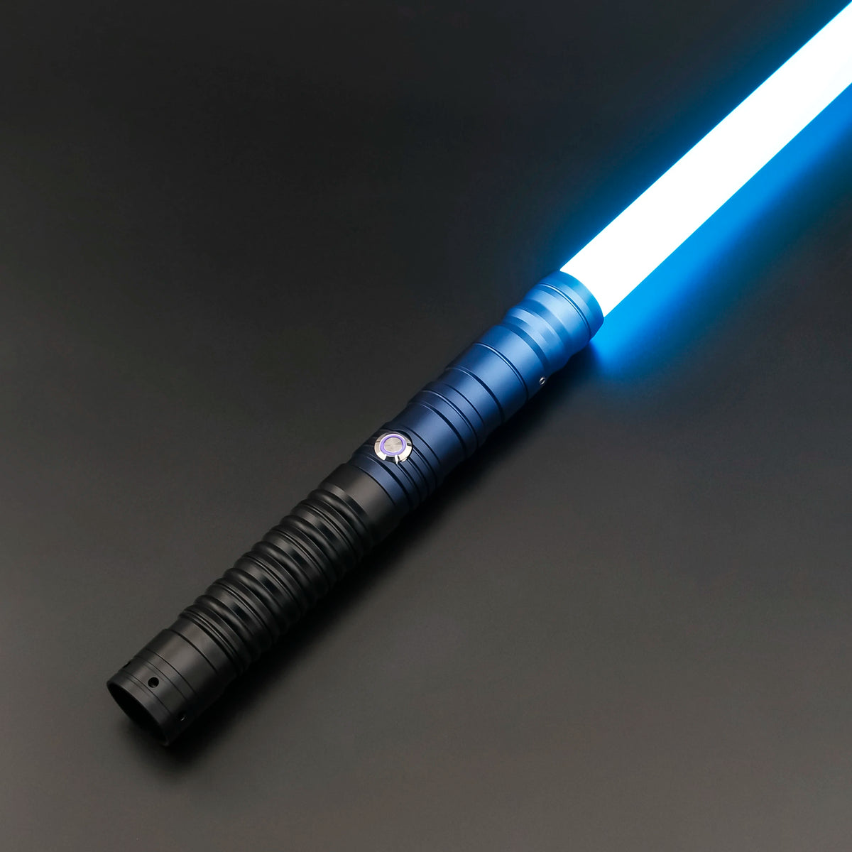 An RGB heavy dueling lightsaber with a blue blade and metal hilt is shown diagonally against a dark background.