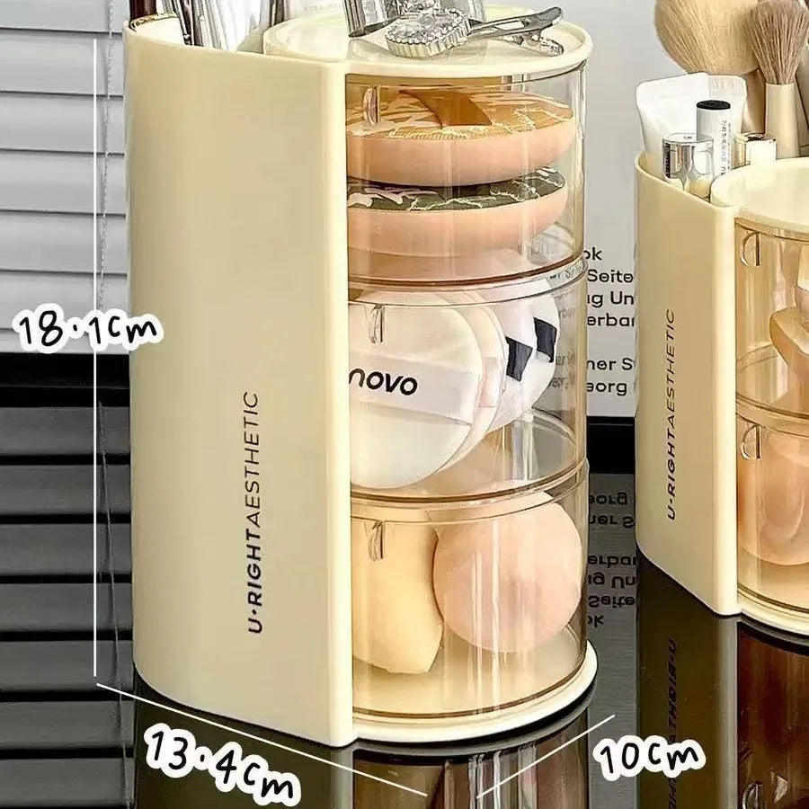 A beige acrylic organizer holding clear acrylic hair accessories with rotating compartments.