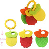A set of silicone fruit teethers and rattles in various colors including orange, yellow, green, and red.