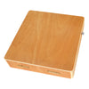 A light wood compact travel cajon drum with a lid and adjustable strap.