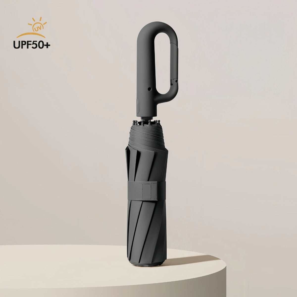 A black fully automatic windproof folding umbrella with a curved handle is shown against a light background.