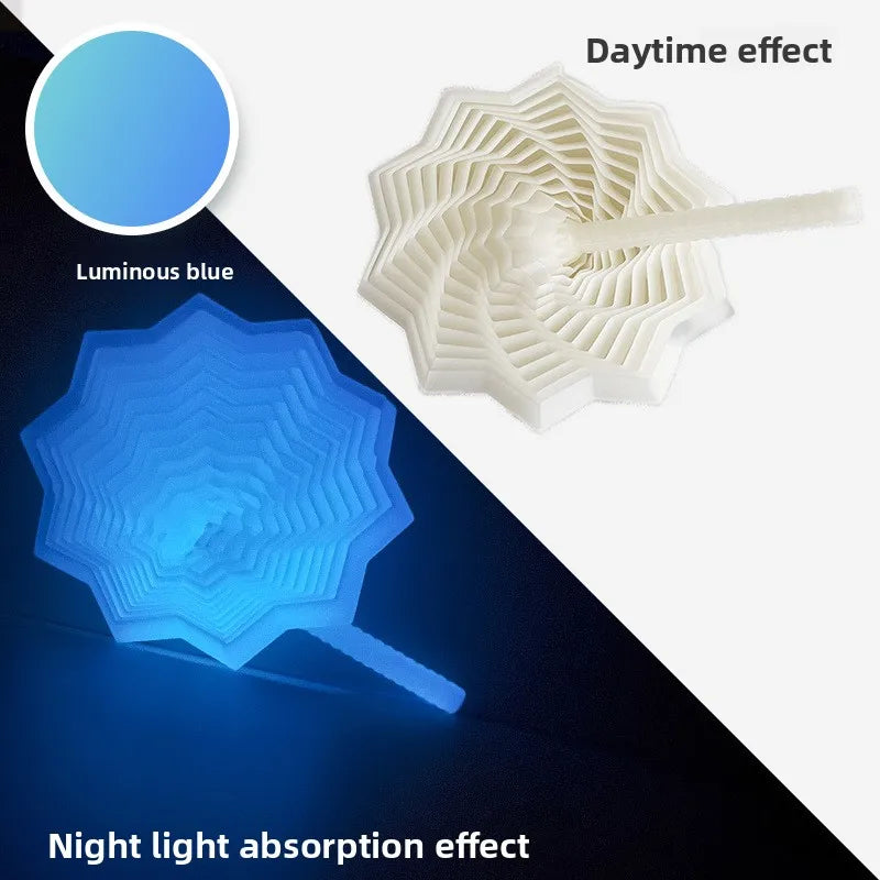 A white 3D illusion fidget star toy demonstrating daytime and night light absorption effects.