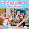 A girl and a boy are playing with colorful squishy ice cube fidget toys in a classroom setting.