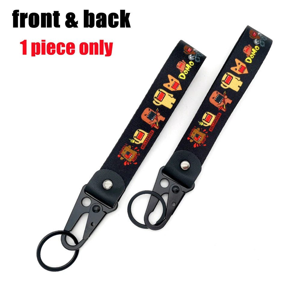 Black lanyard with a repeating anime girl keychain charm and steel clip.