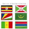 Four embroidered patches of the Dominican Republic flag in various designs and colors.