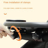 A hand adjusts the 360 degree rotation of a black stroller snack tray with clamps.
