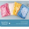 A display of colorful disposable transparent waterproof shower caps in pink, white, yellow, and blue.