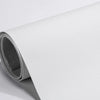 A roll of white self-adhesive PU leather repair patches is shown, rolled up and partially unrolled.