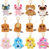 A collection of colorful, quirky ugly monster plush keychains featuring various animal and creature designs.