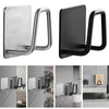 Stainless steel wall-mounted sponge holder with drain in silver and black finishes.