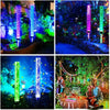 Vertical LED path lights illuminate a garden scene with vibrant colors and sparkling effects.