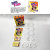 A box of Wipe Pom party guessing cards and several clear plastic cards are displayed on a white surface.