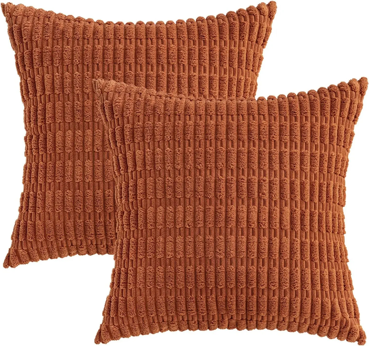 A set of two rust-colored corduroy throw pillow covers with a vertical ribbed texture.