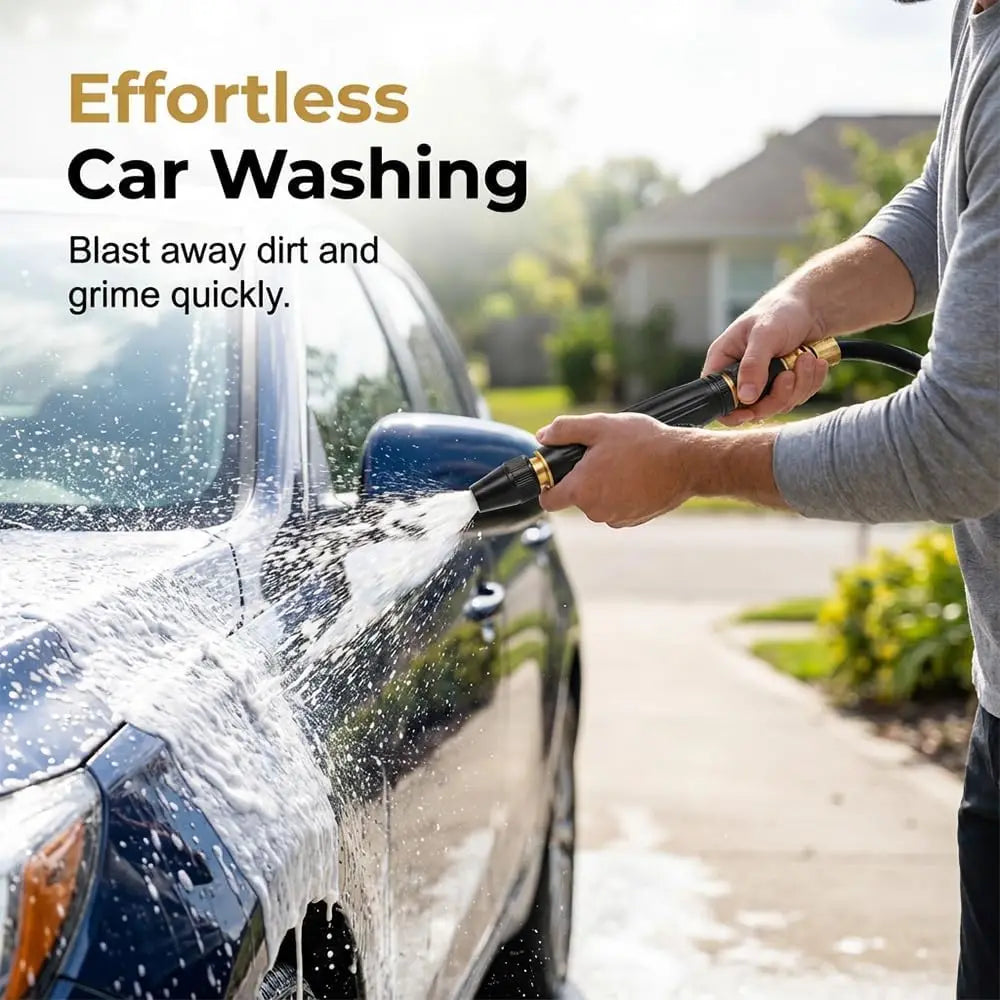 A person is using a high pressure power washer nozzle to clean the exterior of a dark blue car.