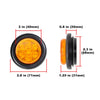 Round flush mount tail light with a clear orange lens and black housing, showing various dimensions.