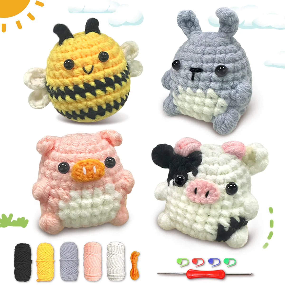 A set of crocheted animal amigurumi figures including a bee, a rabbit, and a pig, along with yarn and crochet needles.