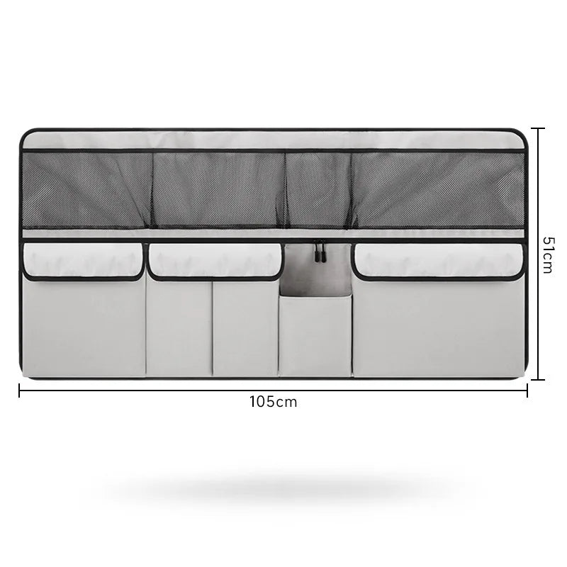 A gray foldable car trunk organizer with seat back storage featuring multiple compartments and a mesh cover.