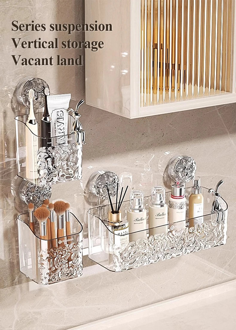 Clear acrylic storage baskets with a water ripple design holding various beauty and grooming products.