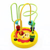 A wooden bead maze roller coaster toy featuring colorful green and yellow tracks.