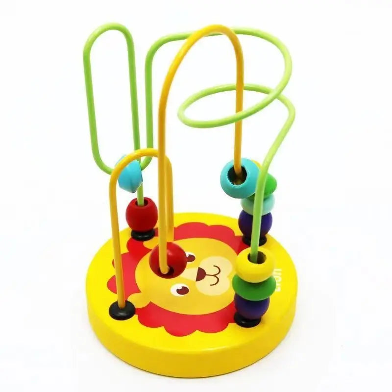 A wooden bead maze roller coaster toy featuring colorful green and yellow tracks.