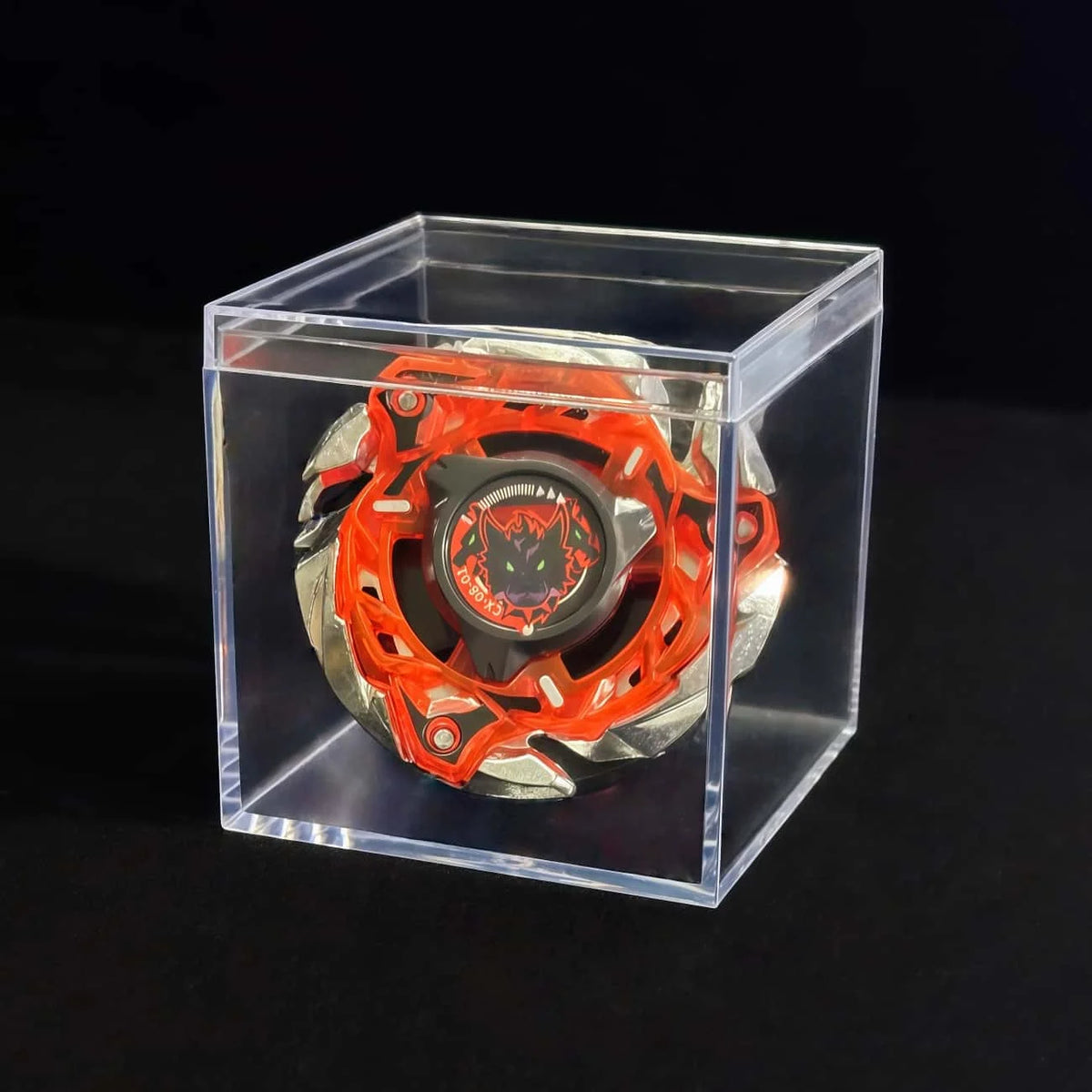 A Valkyrie Volt S4-70V metal spinning top with launcher displayed inside a clear plastic box.