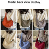 Model back view display showing various colors of a lightweight nylon crossbody bag with adjustable straps.