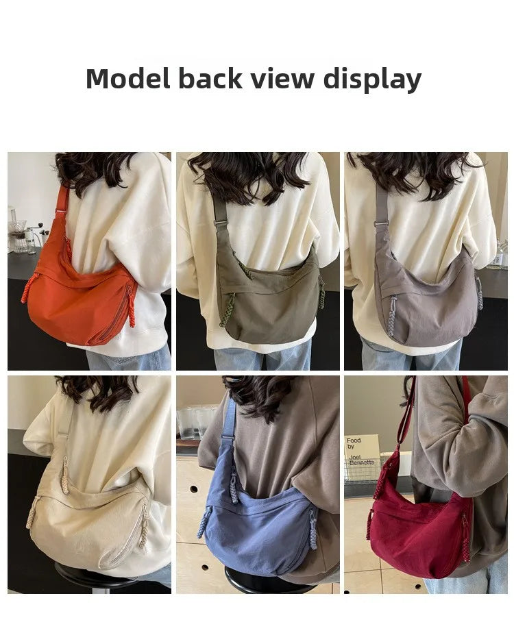 Model back view display showing various colors of a lightweight nylon crossbody bag with adjustable straps.