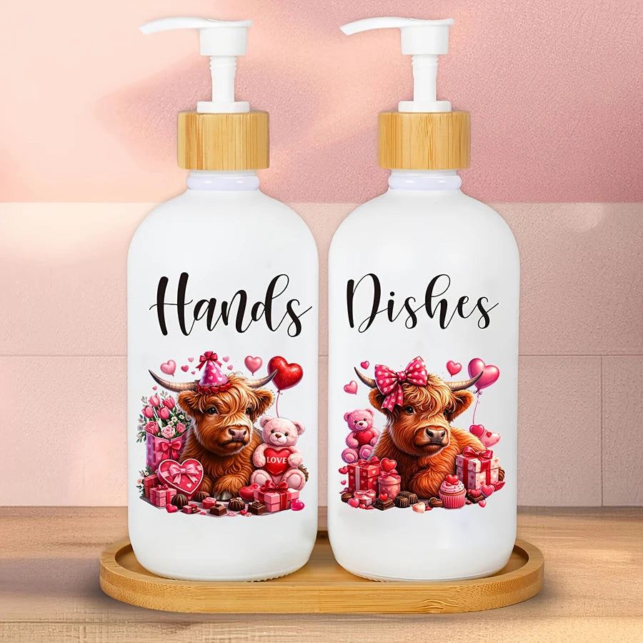 White soap dispensers with wooden caps and labels featuring illustrations of Highland cows and red gifts on a wooden tray