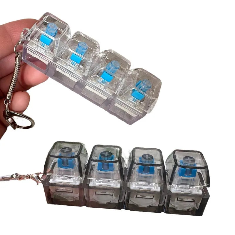 A clear plastic LED light-up keyboard keychain fidget toy with blue lights attached to a metal chain.