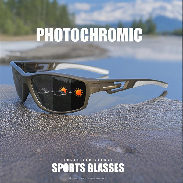 A pair of dark sunglasses with polarized lenses resting on a textured surface, featuring an orange sun graphic.