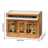 A wooden dollhouse miniature assembly kit featuring a coffee and bakery storefront with glass windows and an awning.