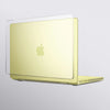 A light yellow protective case for a MacBook laptop.