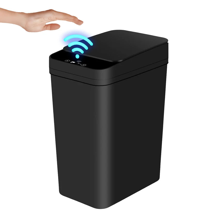 A black motion sensor slim trash can with an automatic lid is shown next to a hand.