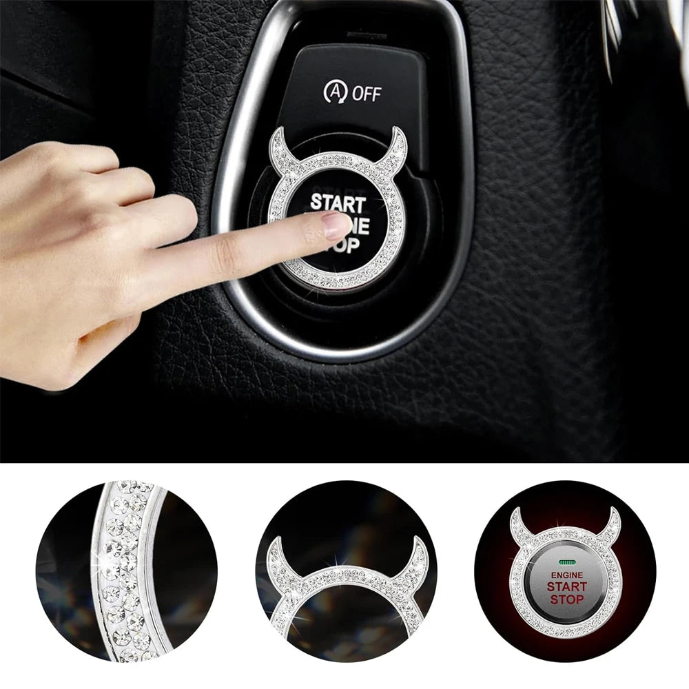 Close-up of a crystal rhinestone ignition button ring on a car door panel.