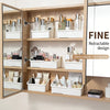 A wooden vanity cabinet with mirrored doors displaying various cosmetic bottles and storage boxes.