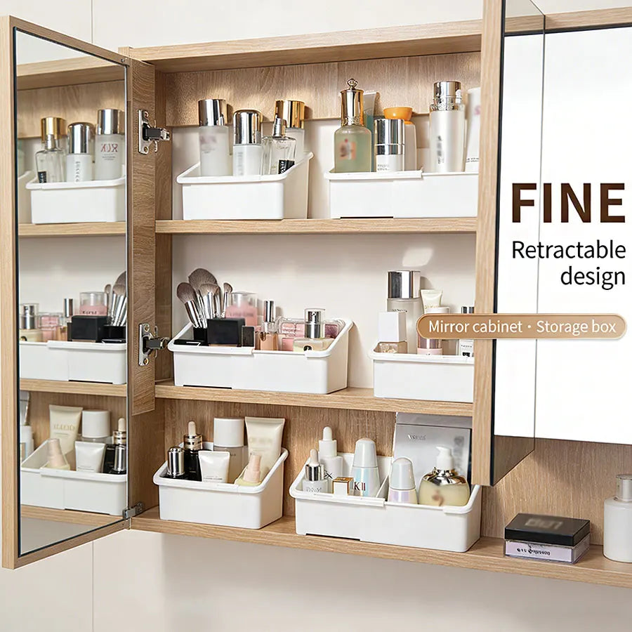 A wooden vanity cabinet with mirrored doors displaying various cosmetic bottles and storage boxes.