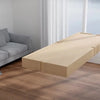A light wood floor mirror with an aluminum frame is displayed on a wooden floor next to a gray sofa.