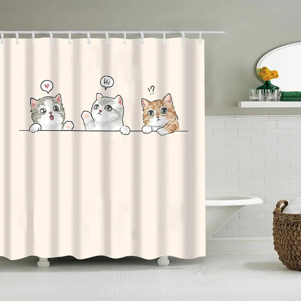 A shower curtain featuring cute cartoon cats with speech bubbles and expressions.