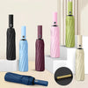 A collection of heavy duty automatic folding umbrellas in various colors including black, light blue, pink, purple, and olive